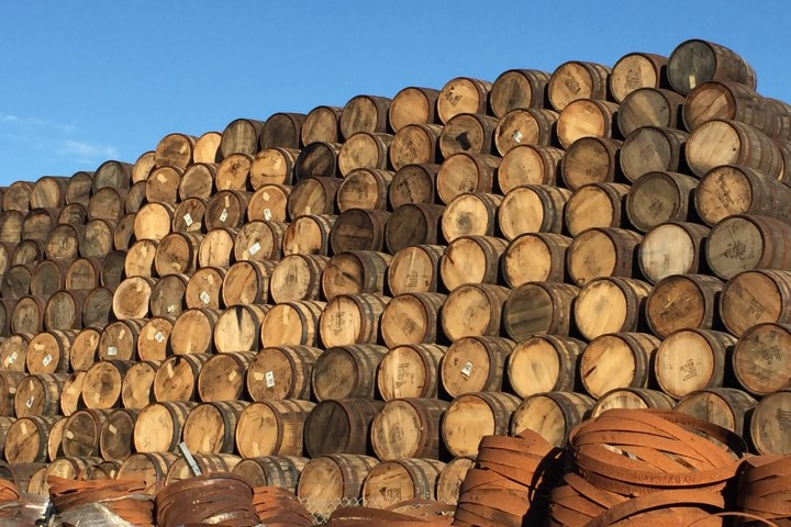 big pile of old beer barrels