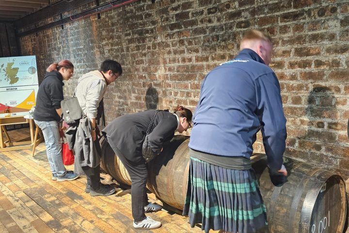 a group of people standing in front of a building